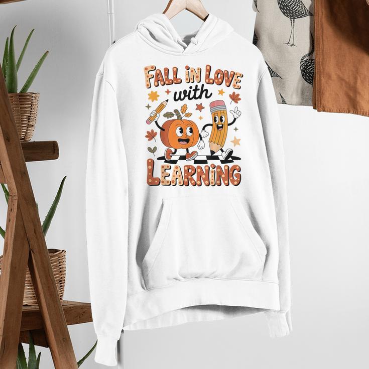 Retro Fall In Love With Learning Autumn Pumpkin Teacher Kids Women's Hoodie, funny gift