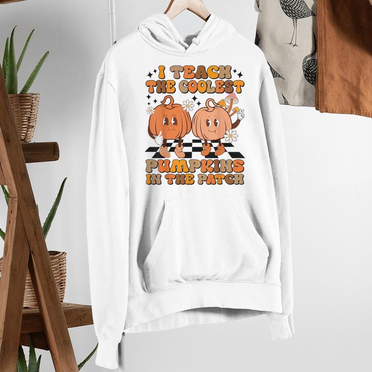 I Teach The Coolest Pumpkins In The Patch Teacher Halloween Women's Hoodie, funny gift