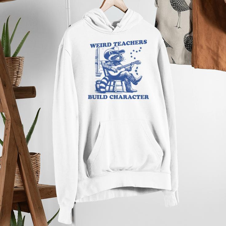 Weird Teachers Build Character Shirt Raccoon Teacher Women's Hoodie, funny gift