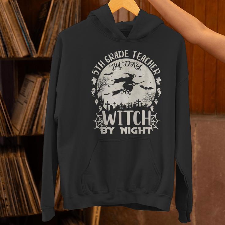 5th Grade Teacher By Day Witch By Night Halloween Women's Hoodie, gift for family, gift for coworker