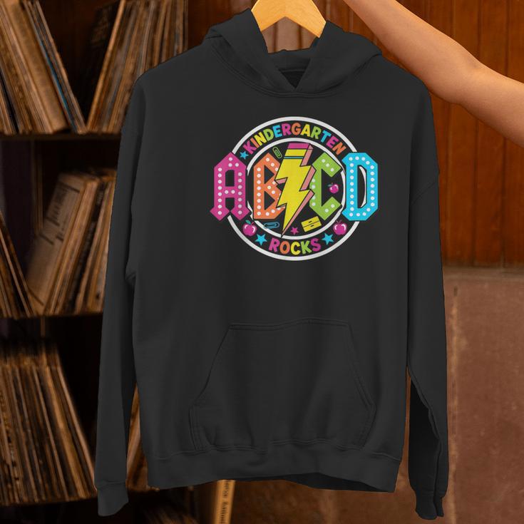 ABCD Kindergarten Rocks Back To School Teachers Students Women's Hoodie, gift for family, gift for coworker ABCD Kindergarten Rocks Back To School Teachers Students Women's Hoodie, gift for family, gift for coworker