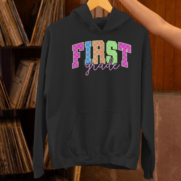 Back To School Neon Checkered First Grade Colorful Teacher Women's Hoodie, First Grade Teacher Hoodies, gift for family, gift for coworker