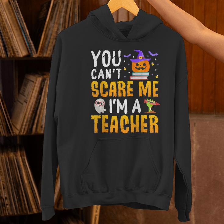 You Cant Scare Me Im A Teacher Halloween Trick Or Teach 2024 Women's Hoodie, gift for family, gift for coworker You Cant Scare Me Im A Teacher Halloween Trick Or Teach 2024 Women's Hoodie, gift for family, gift for coworker