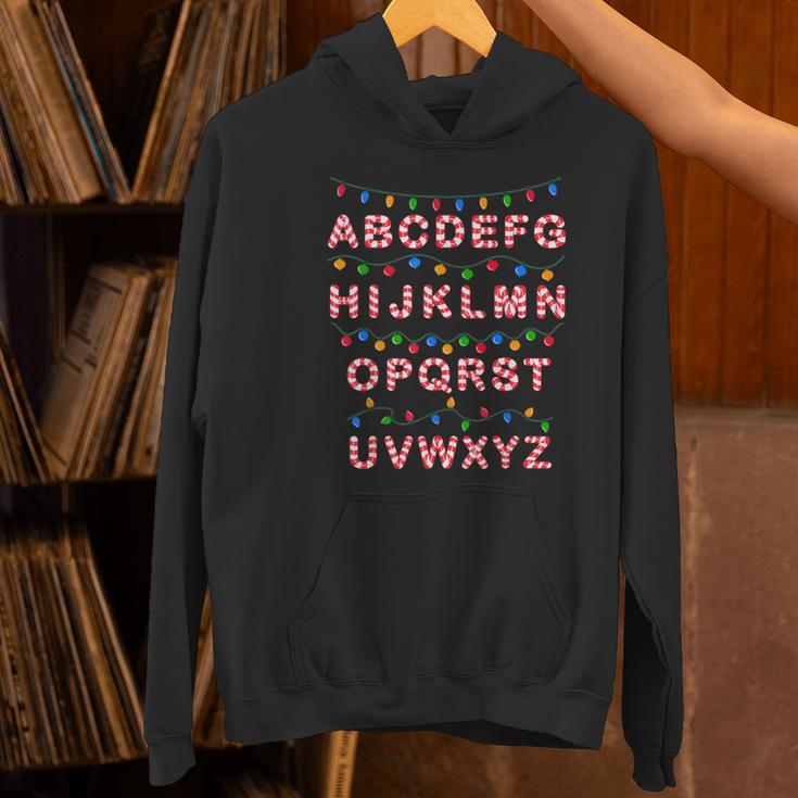 Christmas Alphabet Candy Cane Teachers Students Candy Cane For Men Women Kids Women's Hoodie, gift for family, gift for coworker