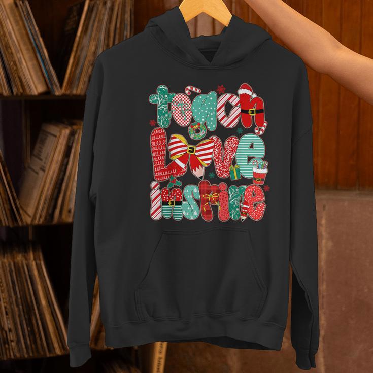 Christmas Coquette Bow Teacher Teach Love Inspire Women's Hoodie, gift for family, gift for coworker
