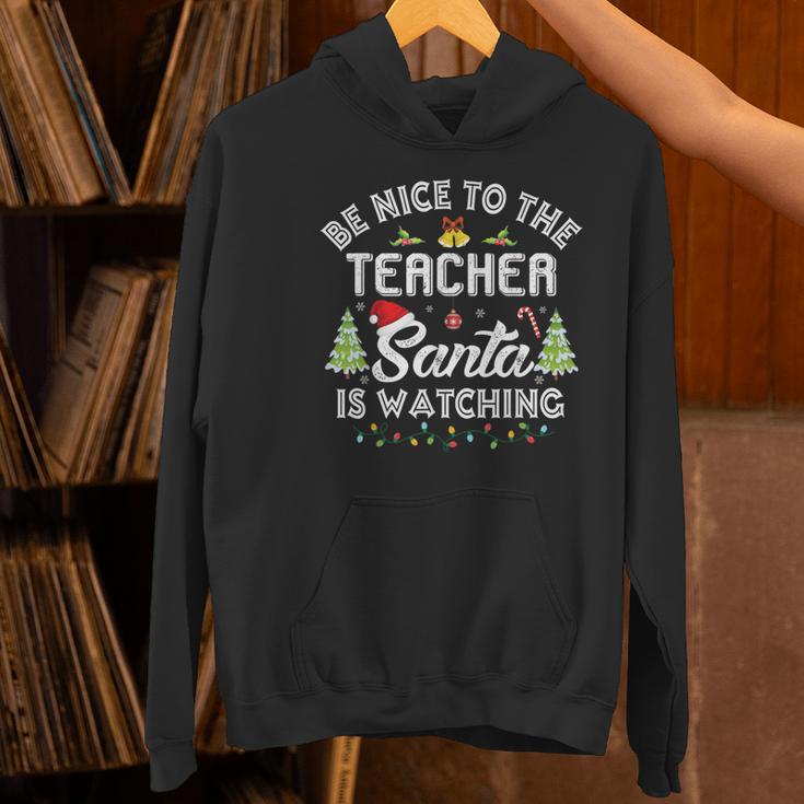 Christmas Be Nice To The Teacher Santa Is Watching Xmas Women's Hoodie, gift for family, gift for coworker Christmas Be Nice To The Teacher Santa Is Watching Xmas Women's Hoodie, gift for family, gift for coworker