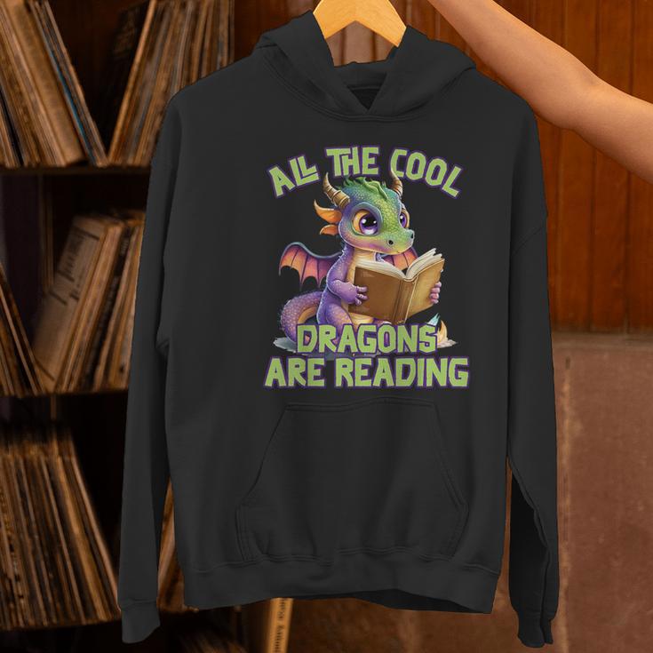 All The Cool Dragons Are Reading Dragon Teacher Women's Hoodie, gift for family, gift for coworker