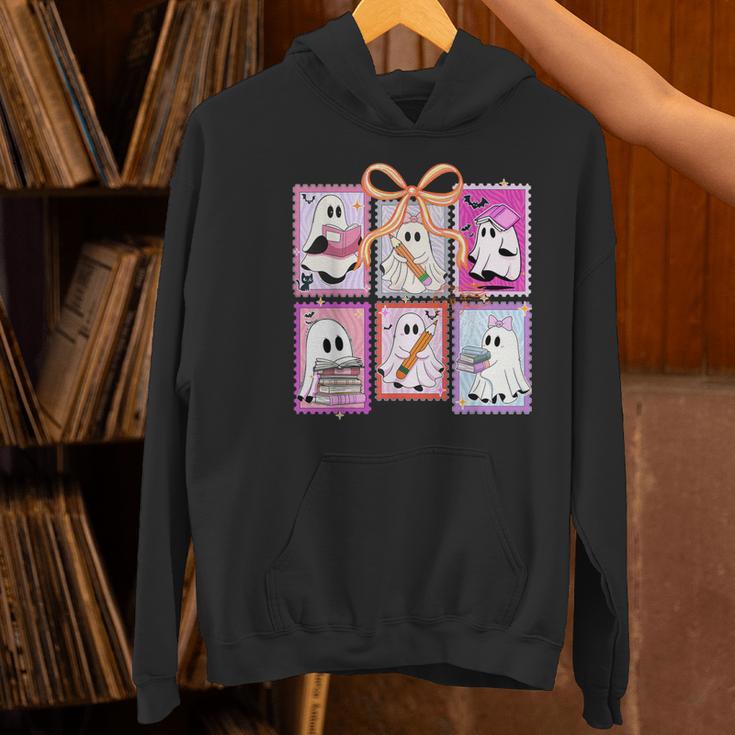 Coquette Bow Spooky Teacher Ghost Halloween Trick Or Teach Women's Hoodie, gift for family, gift for coworker Coquette Bow Spooky Teacher Ghost Halloween Trick Or Teach Women's Hoodie, gift for family, gift for coworker