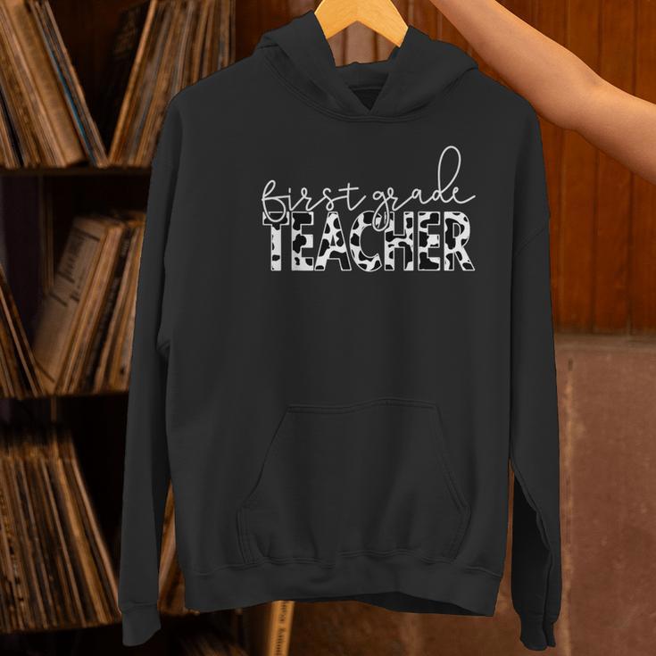Cow Print For Elementary School First Grade Teachers Women's Hoodie, First Grade Teacher Hoodies, gift for family, gift for coworker Cow Print For Elementary School First Grade Teachers Women's Hoodie, First Grade Teacher Hoodies, gift for family, gift for coworker