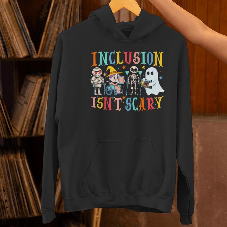 Cute Inclusion Isn't Scary Teacher Skeleton Ghost Halloween Women's Hoodie, gift for family, gift for coworker Cute Inclusion Isn't Scary Teacher Skeleton Ghost Halloween Women's Hoodie, gift for family, gift for coworker