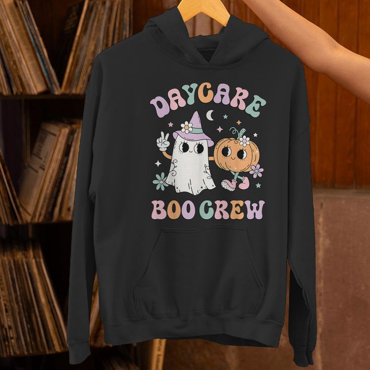 Daycare Boo Crew Groovy Halloween Floral Ghost Kid Teacher Women's Hoodie, Groovy Teacher Hoodies, gift for family, gift for coworker Daycare Boo Crew Groovy Halloween Floral Ghost Kid Teacher Women's Hoodie, Groovy Teacher Hoodies, gift for family, gift for coworker