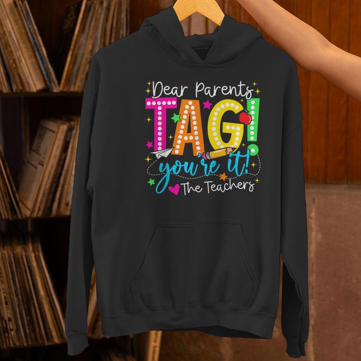 Dear Parents Tag You'Re It Love Teachers Last Day Of School Women's Hoodie, gift for family, gift for coworker Dear Parents Tag You'Re It Love Teachers Last Day Of School Women's Hoodie, gift for family, gift for coworker