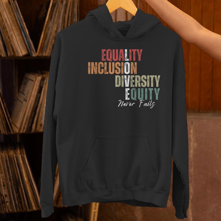 Equality Inclusion Diversity Equity Love Never Fails Teacher Women's Hoodie, gift for family, gift for coworker