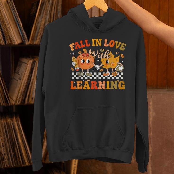 Fall In Love With Learning Autumn Pumpkin Fall Teacher Kids Women's Hoodie, gift for family, gift for coworker Fall In Love With Learning Autumn Pumpkin Fall Teacher Kids Women's Hoodie, gift for family, gift for coworker