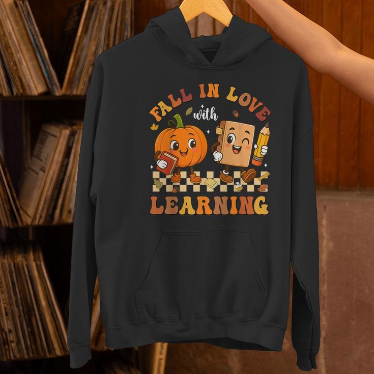 Fall In Love With Reading Book Autumn Pumpkins And Teachers Women's Hoodie, gift for family, gift for coworker Fall In Love With Reading Book Autumn Pumpkins And Teachers Women's Hoodie, gift for family, gift for coworker