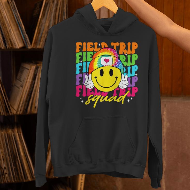 Field Trip Squad Groovy Field Day Smile Face Teacher Tie Dye Women's Hoodie, Groovy Teacher Hoodies, gift for family, gift for coworker Field Trip Squad Groovy Field Day Smile Face Teacher Tie Dye Women's Hoodie, Groovy Teacher Hoodies, gift for family, gift for coworker