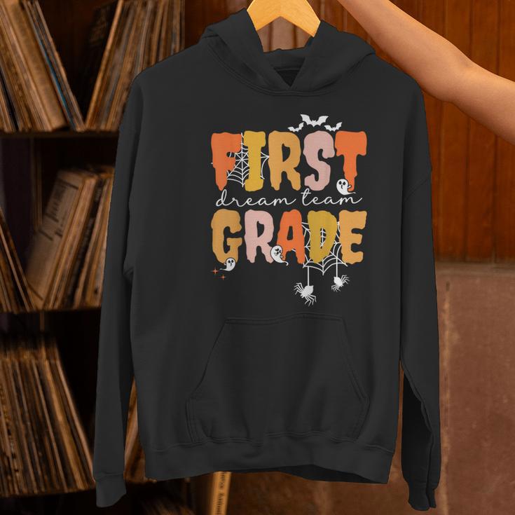 First Grade Dream Retro Team Fall Halloween Spooky Teachers Women's Hoodie, First Grade Teacher Hoodies, gift for family, gift for coworker First Grade Dream Retro Team Fall Halloween Spooky Teachers Women's Hoodie, First Grade Teacher Hoodies, gift for family, gift for coworker