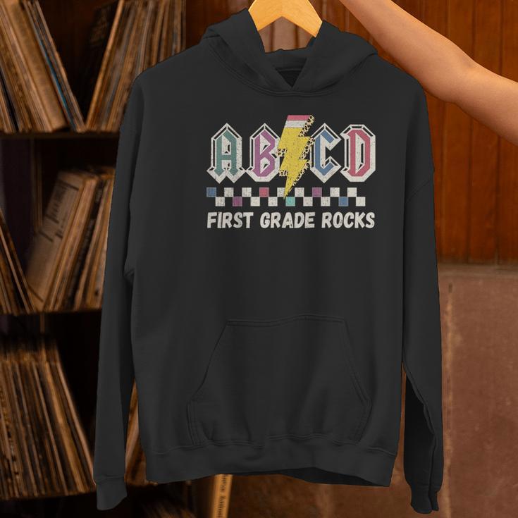First Grade Rocks Teachers Back To School ABCD Rock Students Women's Hoodie, First Grade Teacher Hoodies, gift for family, gift for coworker First Grade Rocks Teachers Back To School ABCD Rock Students Women's Hoodie, First Grade Teacher Hoodies, gift for family, gift for coworker