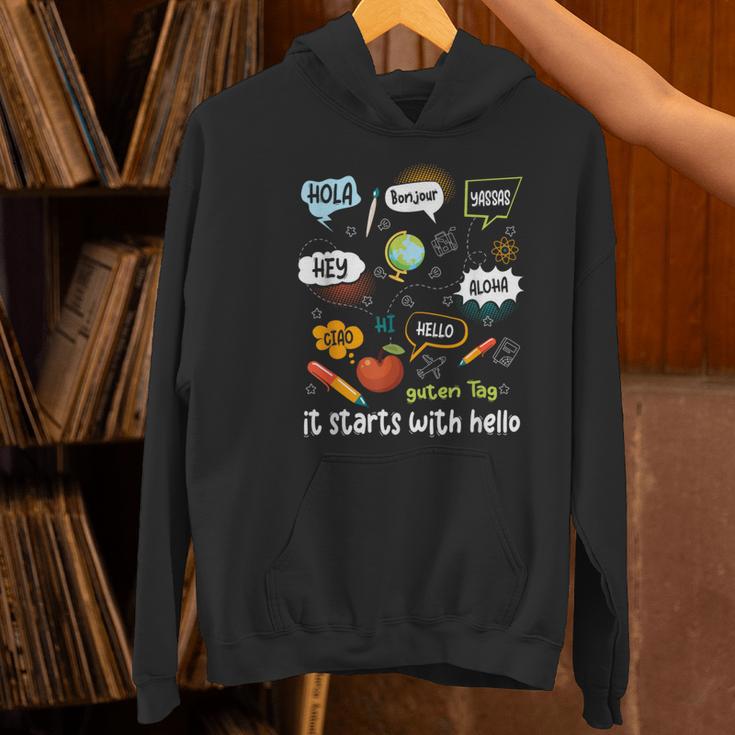 Friendship Inclusion Language Teacher It Starts With Hello Women's Hoodie, gift for family, gift for coworker Friendship Inclusion Language Teacher It Starts With Hello Women's Hoodie, gift for family, gift for coworker