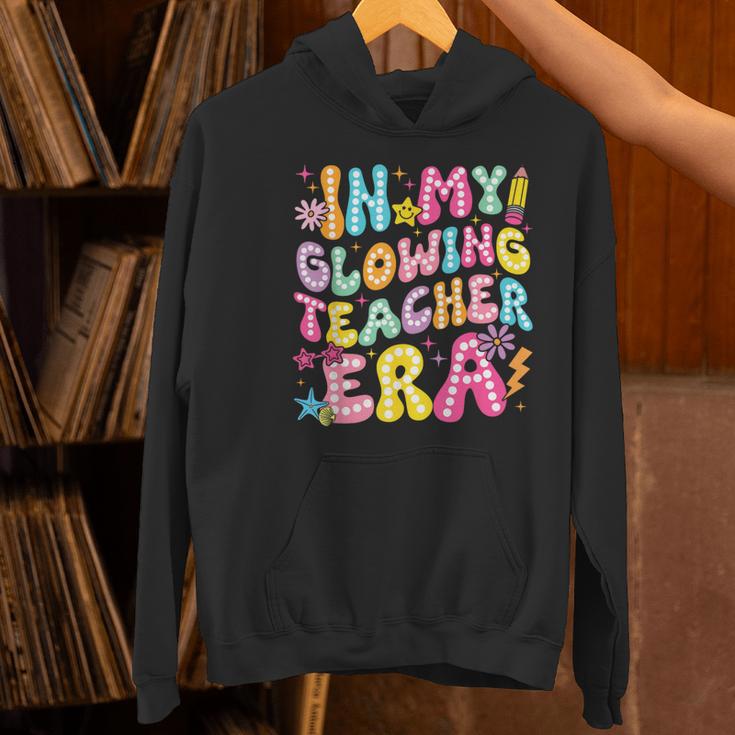 In My Glowing Teacher Era Teaching Back To School Women's Hoodie, gift for family, gift for coworker In My Glowing Teacher Era Teaching Back To School Women's Hoodie, gift for family, gift for coworker