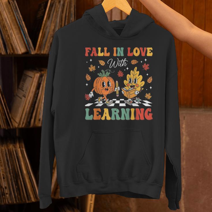Groovy Fall In Love With Learning Autumn Pumpkin Teacher Women's Hoodie, Groovy Teacher Hoodies, gift for family, gift for coworker Groovy Fall In Love With Learning Autumn Pumpkin Teacher Women's Hoodie, Groovy Teacher Hoodies, gift for family, gift for coworker