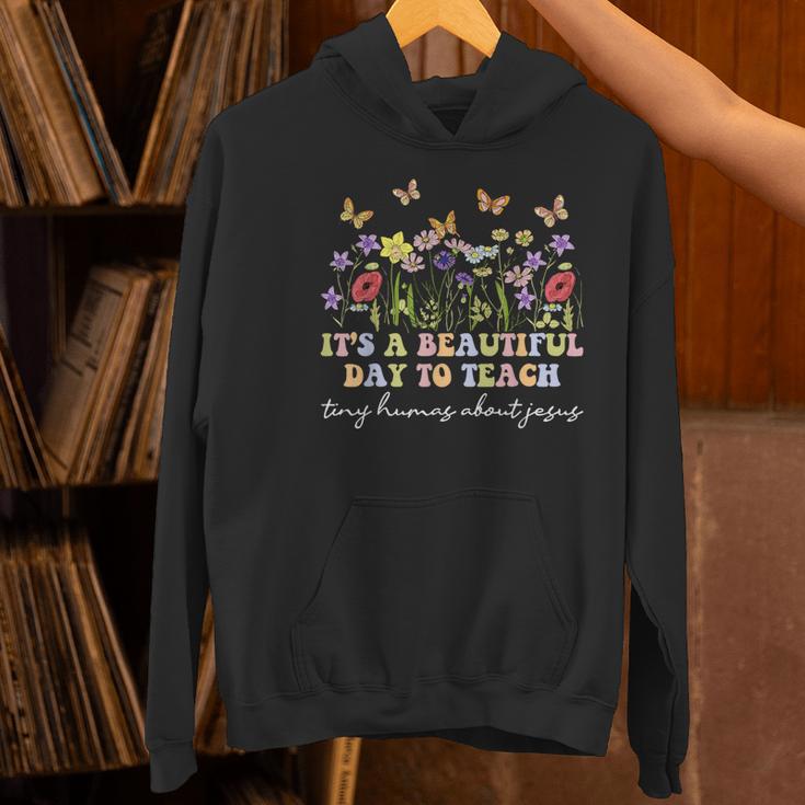 Groovy I Teach Tiny Humans About Jesus Christian Teacher Women's Hoodie, Groovy Teacher Hoodies, gift for family, gift for coworker Groovy I Teach Tiny Humans About Jesus Christian Teacher Women's Hoodie, Groovy Teacher Hoodies, gift for family, gift for coworker