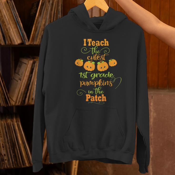 Halloween Cutest Pumpkins First Grade Teacher Women's Hoodie, First Grade Teacher Hoodies, gift for family, gift for coworker
