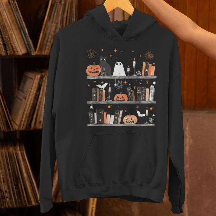 Halloween Library Ghost Books Teacher Spooky Trick Or Teach Women's Hoodie, gift for family, gift for coworker Halloween Library Ghost Books Teacher Spooky Trick Or Teach Women's Hoodie, gift for family, gift for coworker