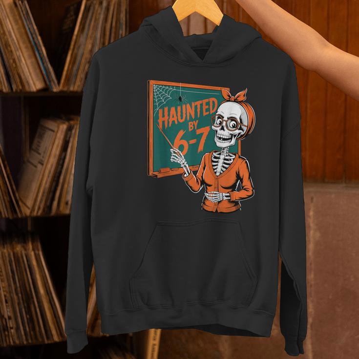 Haunted By 6-7 Six Seven 67 Math Teacher Halloween Skeleton Women's Hoodie, gift for family, gift for coworker Haunted By 6-7 Six Seven 67 Math Teacher Halloween Skeleton Women's Hoodie, gift for family, gift for coworker