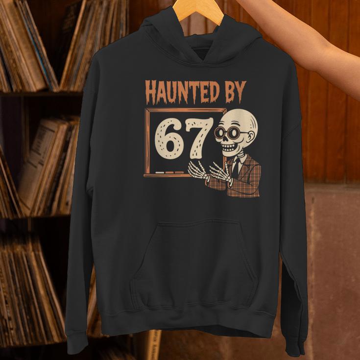 Haunted By 67 Halloween 67 Meme Six Seven Teacher Women's Hoodie, gift for family, gift for coworker Haunted By 67 Halloween 67 Meme Six Seven Teacher Women's Hoodie, gift for family, gift for coworker