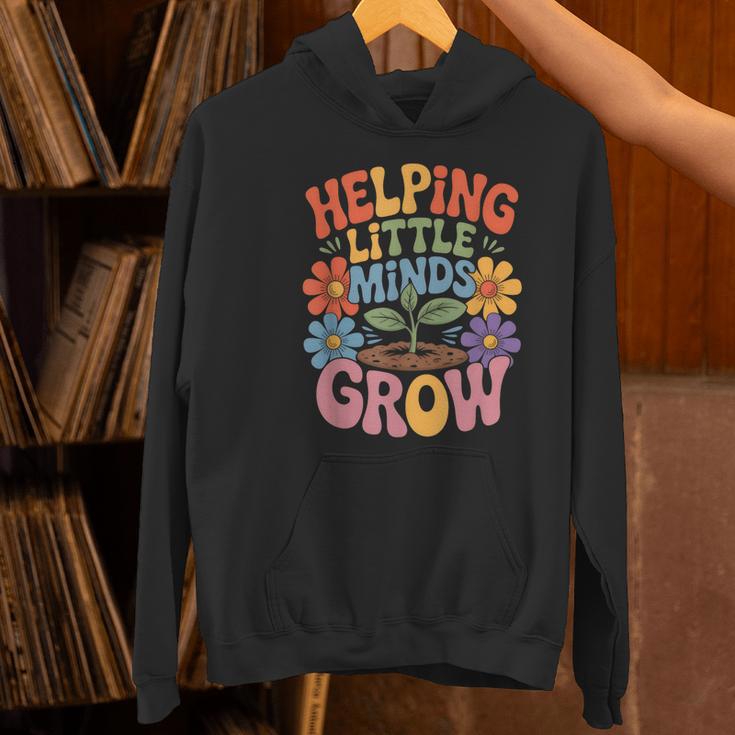 Helping Little Minds Grow Teacher First Day Back To School Women's Hoodie, gift for family, gift for coworker Helping Little Minds Grow Teacher First Day Back To School Women's Hoodie, gift for family, gift for coworker