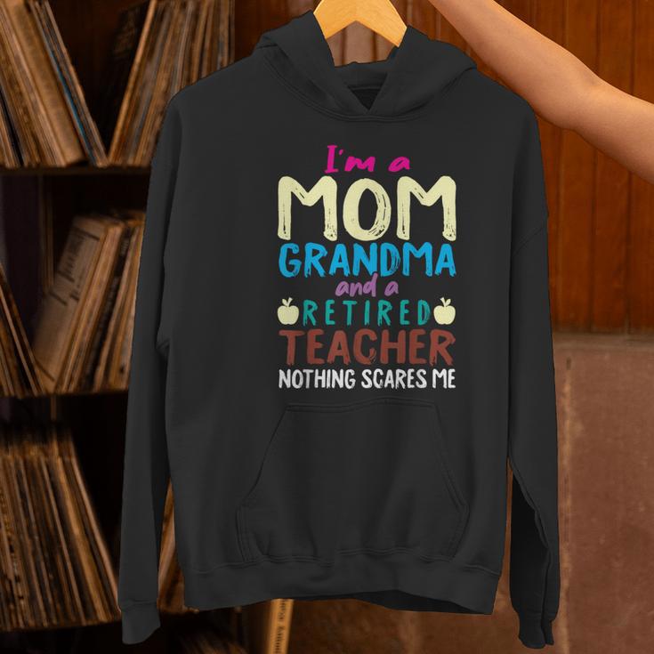 I'm Mom Grandma And A Retired Teacher Nothing Scares Me Men Women Women's Hoodie, gift for family, gift for coworker I'm Mom Grandma And A Retired Teacher Nothing Scares Me Men Women Women's Hoodie, gift for family, gift for coworker