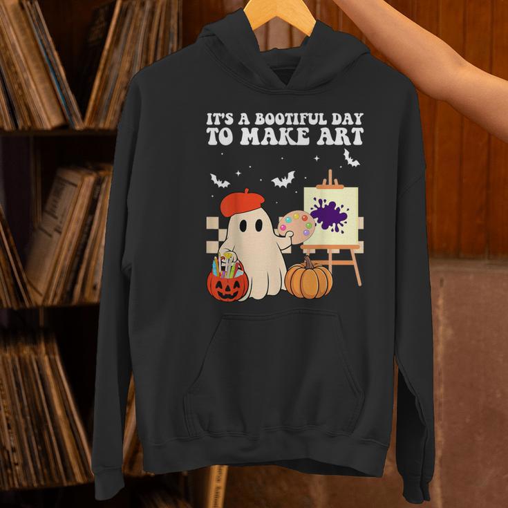 It's A Bootiful Day To Make Art Groovy Art Teacher Halloween Women's Hoodie, Groovy Teacher Hoodies, gift for family, gift for coworker