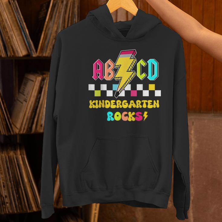 Kindergarten ABCD Rocks Teacher Student Back To School Women's Hoodie, gift for family, gift for coworker Kindergarten ABCD Rocks Teacher Student Back To School Women's Hoodie, gift for family, gift for coworker