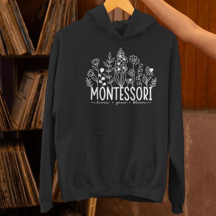 Learn Grow Bloom Wildflowers Appreciation Montessori Teacher Women's Hoodie, gift for family, gift for coworker