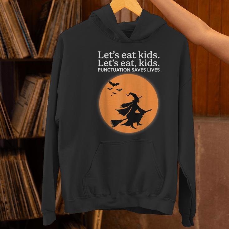 Let's Eat Kids Punctuation Saves Live Witch Grammar Teacher Women's Hoodie, gift for family, gift for coworker