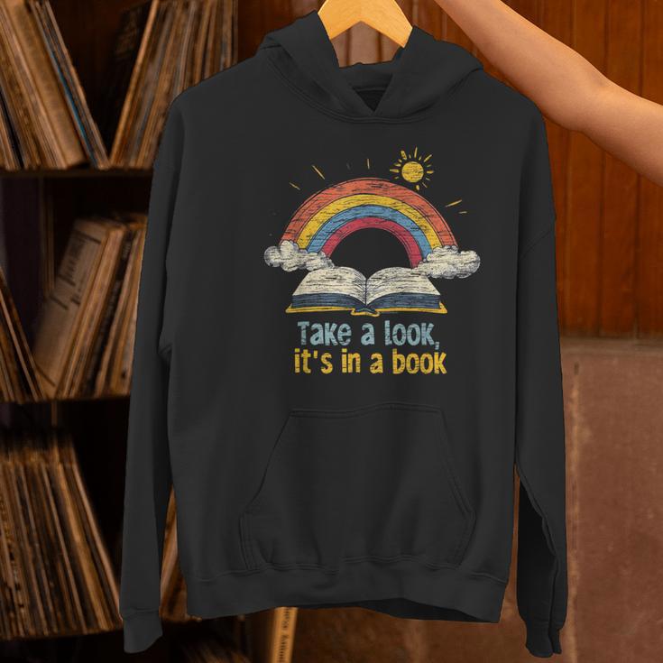 Take a Look It's In a Book Vintage Reading Teacher Rainbow Women's Hoodie, gift for family, gift for coworker Take a Look It's In a Book Vintage Reading Teacher Rainbow Women's Hoodie, gift for family, gift for coworker