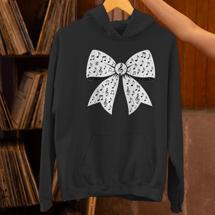 Music Notes Coquette Bow Music Teacher School Musician Band Women's Hoodie, gift for family, gift for coworker Music Notes Coquette Bow Music Teacher School Musician Band Women's Hoodie, gift for family, gift for coworker