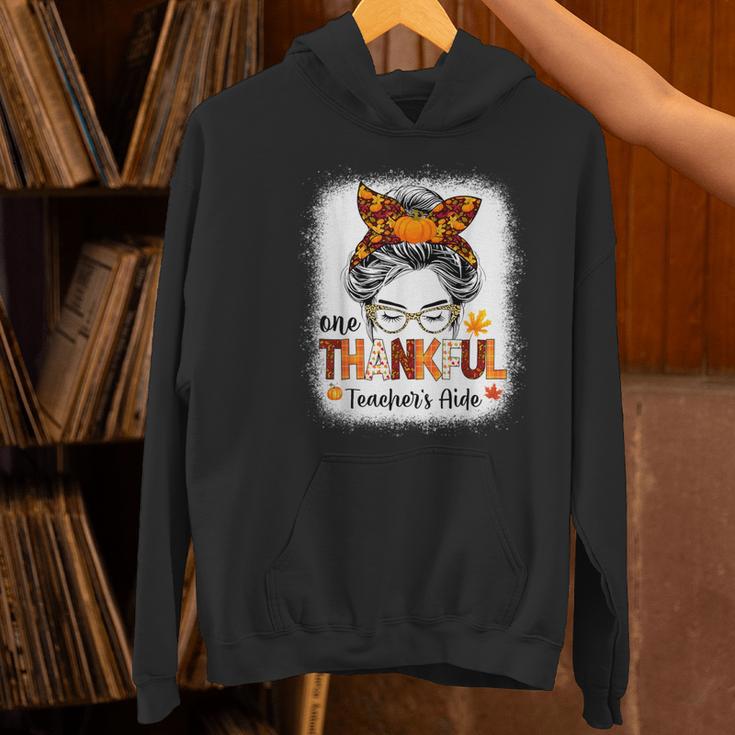 One Thankful Teacher's Aide Messy Bun Thanksgiving Fall Women's Hoodie, gift for family, gift for coworker One Thankful Teacher's Aide Messy Bun Thanksgiving Fall Women's Hoodie, gift for family, gift for coworker