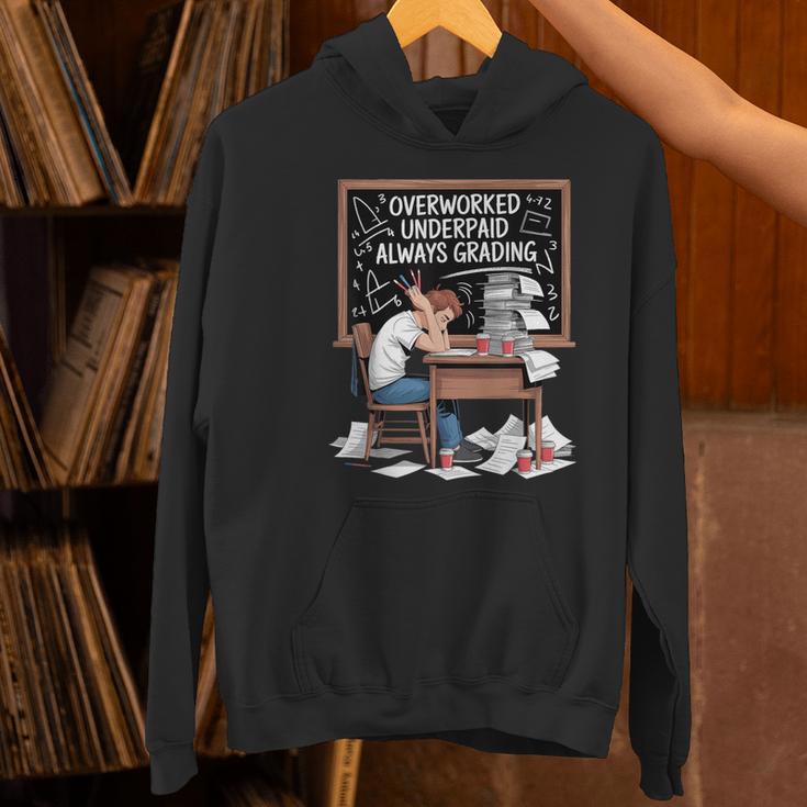 Overworked Underpaid Always Grading Teacher Women's Hoodie, gift for family, gift for coworker