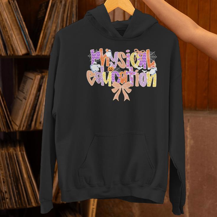 Physical Education Halloween Bow Checkered Teacher Ghost PE Women's Hoodie, Pe Teacher Hoodies, gift for family, gift for coworker