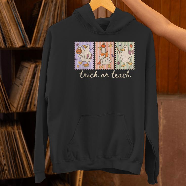 Preppy Goose Teacher Trick Or Teach Halloween Teacher Goose Women's Hoodie, gift for family, gift for coworker Preppy Goose Teacher Trick Or Teach Halloween Teacher Goose Women's Hoodie, gift for family, gift for coworker