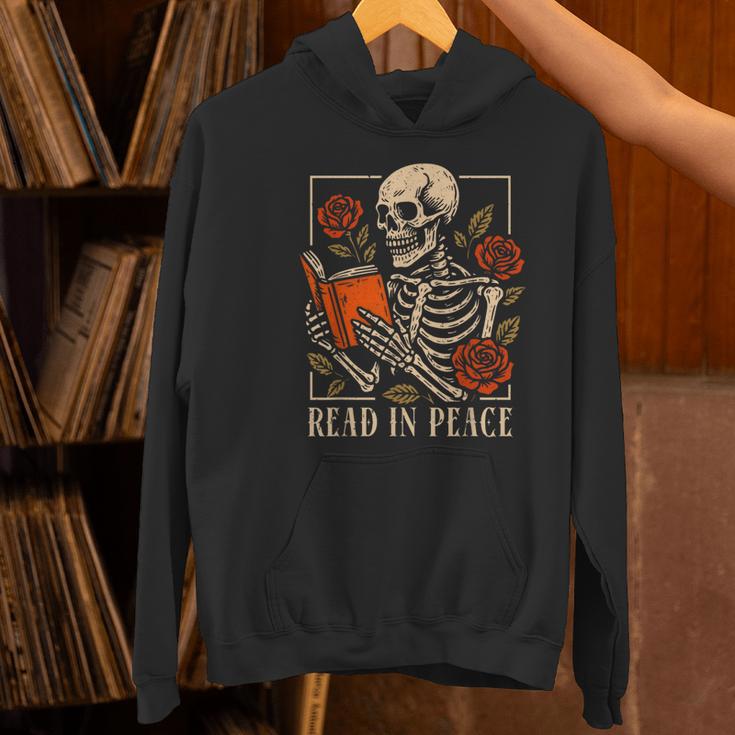 Read In Peace Skeleton Reading Book Halloween Teacher Women's Hoodie, gift for family, gift for coworker