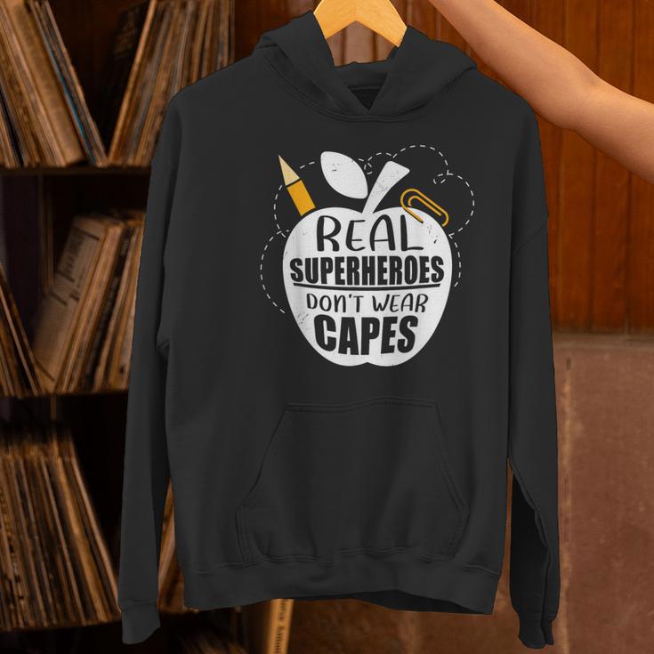 Real Superheroes Wear No Capes Teacher Design Teach Women's Hoodie, gift for family, gift for coworker Real Superheroes Wear No Capes Teacher Design Teach Women's Hoodie, gift for family, gift for coworker