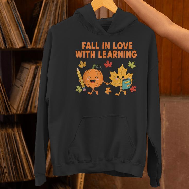 Retro Fall In Love With Learning Autumn Pumpkin Teacher Women's Hoodie, gift for family, gift for coworker