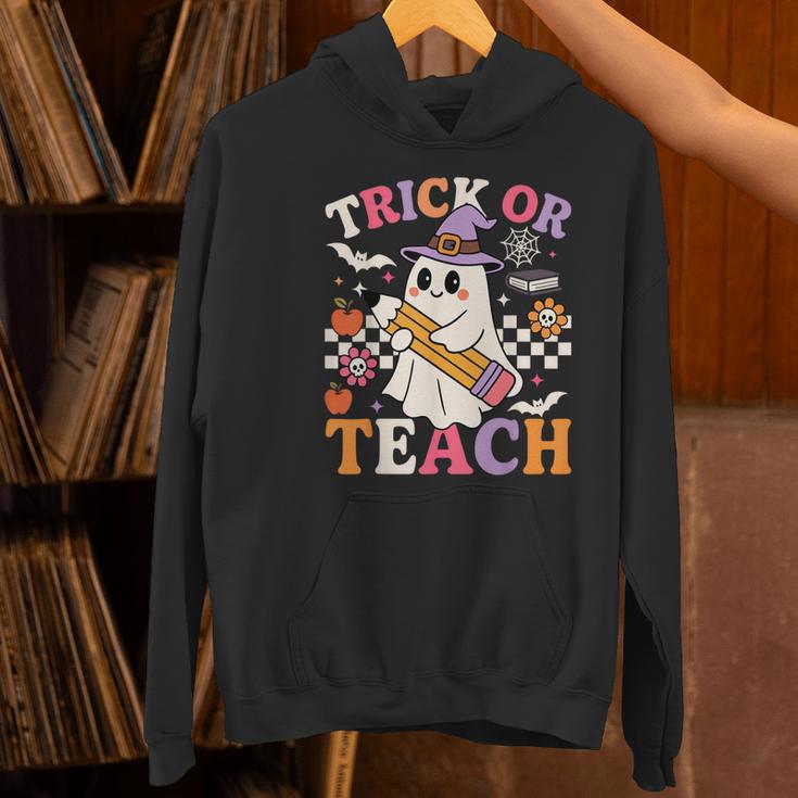 Retro Floral Ghost Trick Or Teach Groovy Teacher Halloween Women's Hoodie, Groovy Teacher Hoodies, gift for family, gift for coworker Retro Floral Ghost Trick Or Teach Groovy Teacher Halloween Women's Hoodie, Groovy Teacher Hoodies, gift for family, gift for coworker