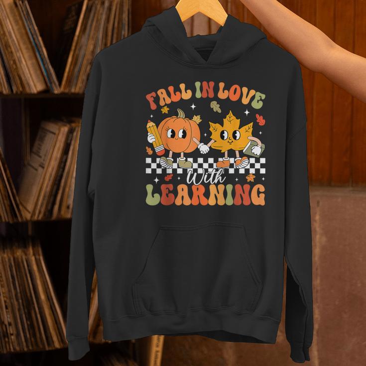 Retro Pumpkin Fall In Love With Learning Autumn Teacher Women's Hoodie, gift for family, gift for coworker Retro Pumpkin Fall In Love With Learning Autumn Teacher Women's Hoodie, gift for family, gift for coworker