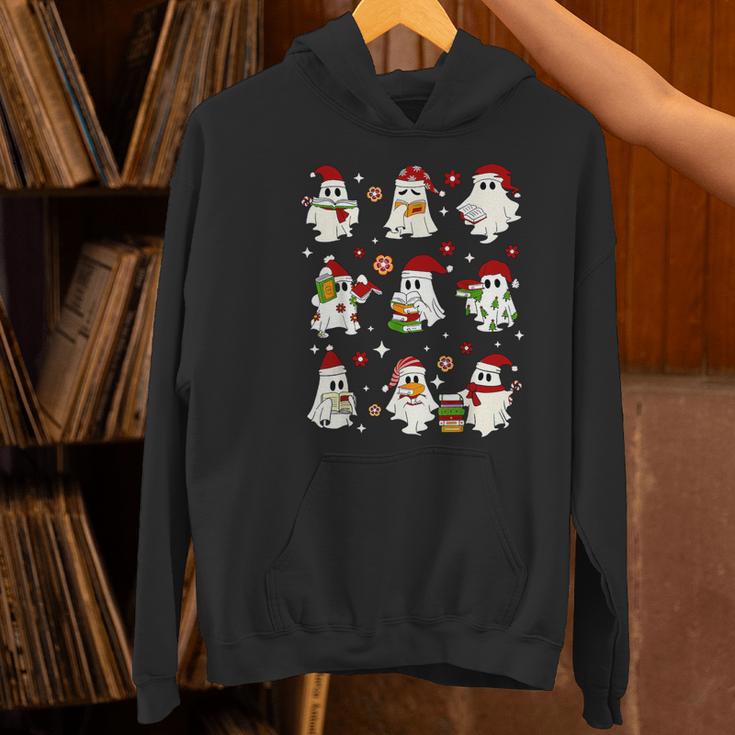 Santa Ghost Reading Books Christmas Library Teacher Women's Hoodie, gift for family, gift for coworker