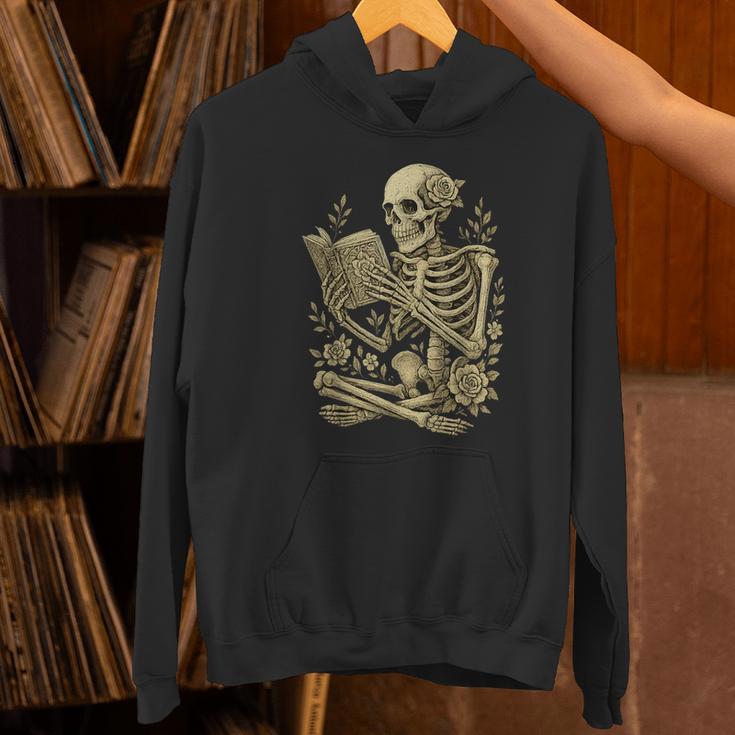 Skeleton Book Floral Skull Halloween Teacher Costume Women's Hoodie, gift for family, gift for coworker Skeleton Book Floral Skull Halloween Teacher Costume Women's Hoodie, gift for family, gift for coworker
