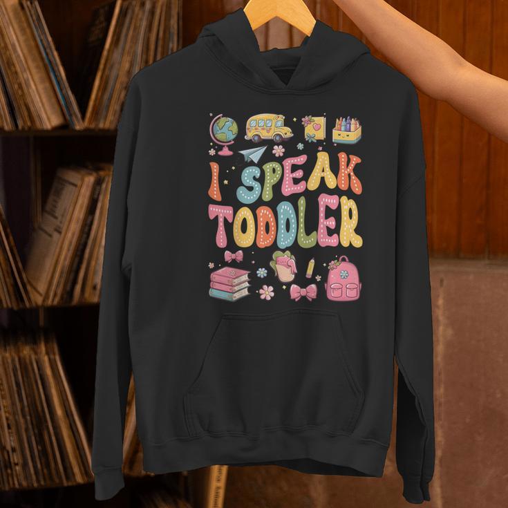 I Speak Toddler Teacher Pre-K Frist Day Back To School Women's Hoodie, gift for family, gift for coworker